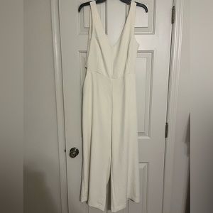 Mod Ref off-white linen jumpsuit with open back & bow